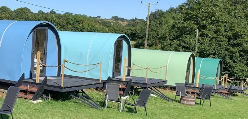 several glamping pods in uk